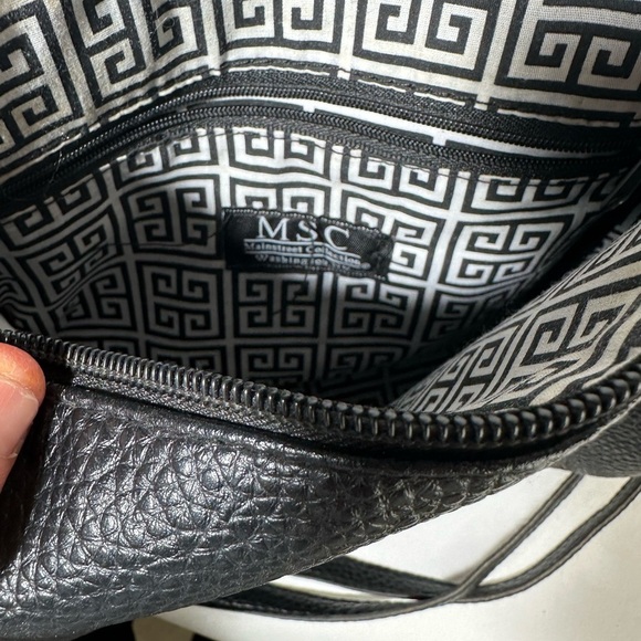 Sleek Black Crossbody Bag with Adjustable Strap and Tassel - Picture 5 of 5